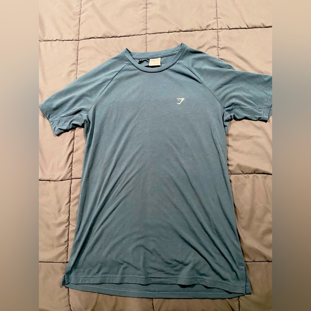 Gymshark athletic short sleeve t shirt. Size medium, color blue.
